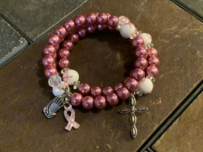 Rose-colored rosary bracelet